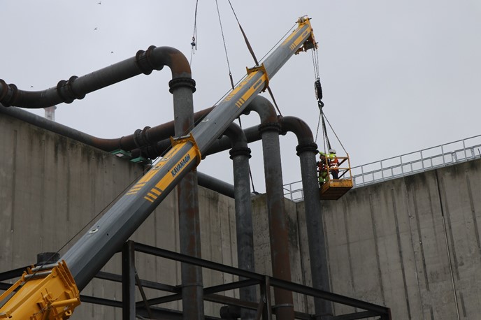 Removal of pipework with crane close up